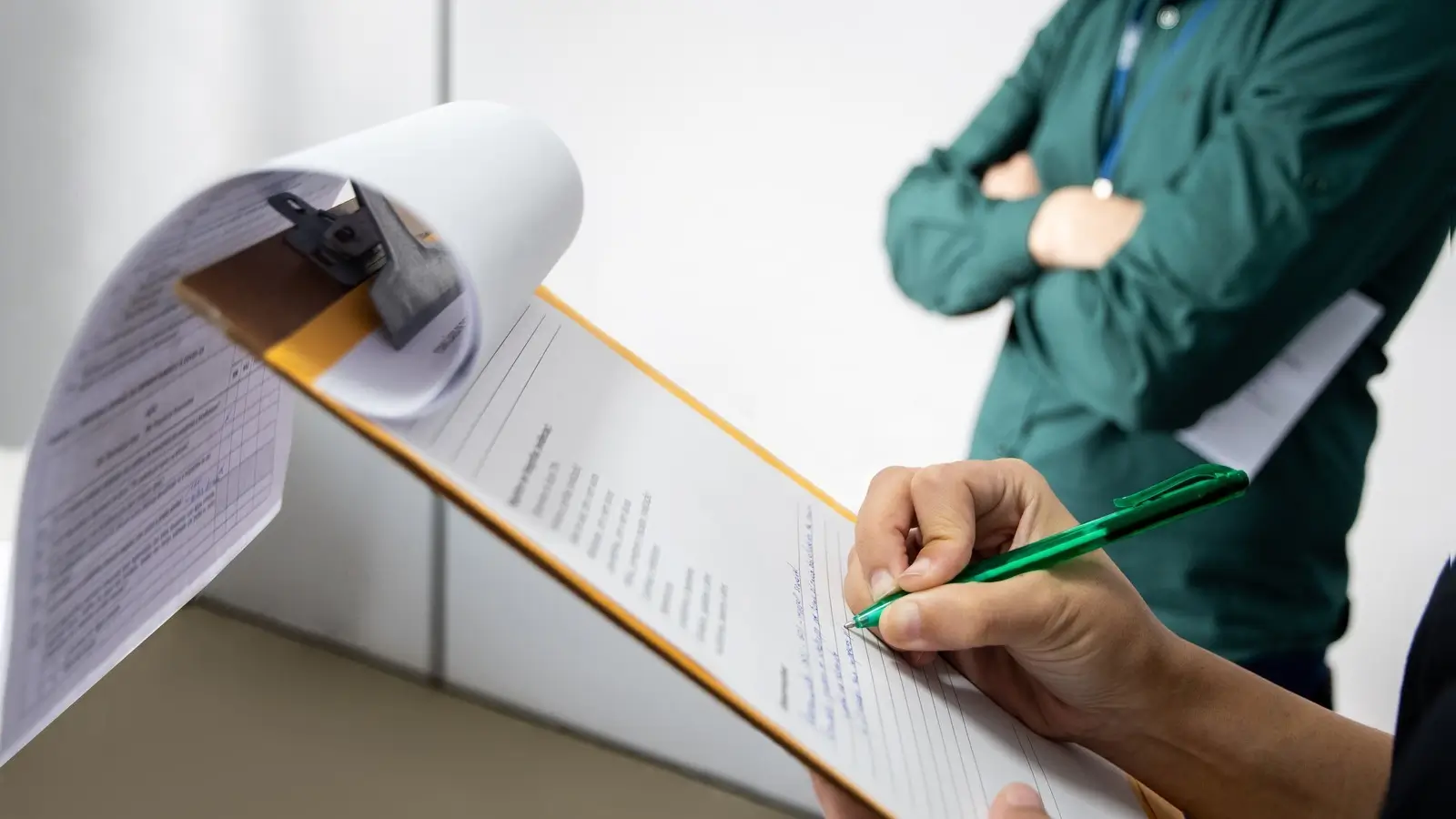 Food safety manager with clipboard